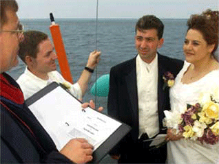 Pauline Landry and Robert Lange June 30th, 2001 on the sailboat El Rio in Shediac Bay N.B. A Viktor Pivovarov/Times & Transcript Photo.